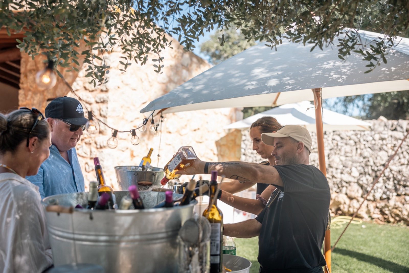 Bar set up beside a pool at a villa party in Mallorca